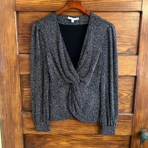 Jonathan Simkhai sparkly black and silver blouse.